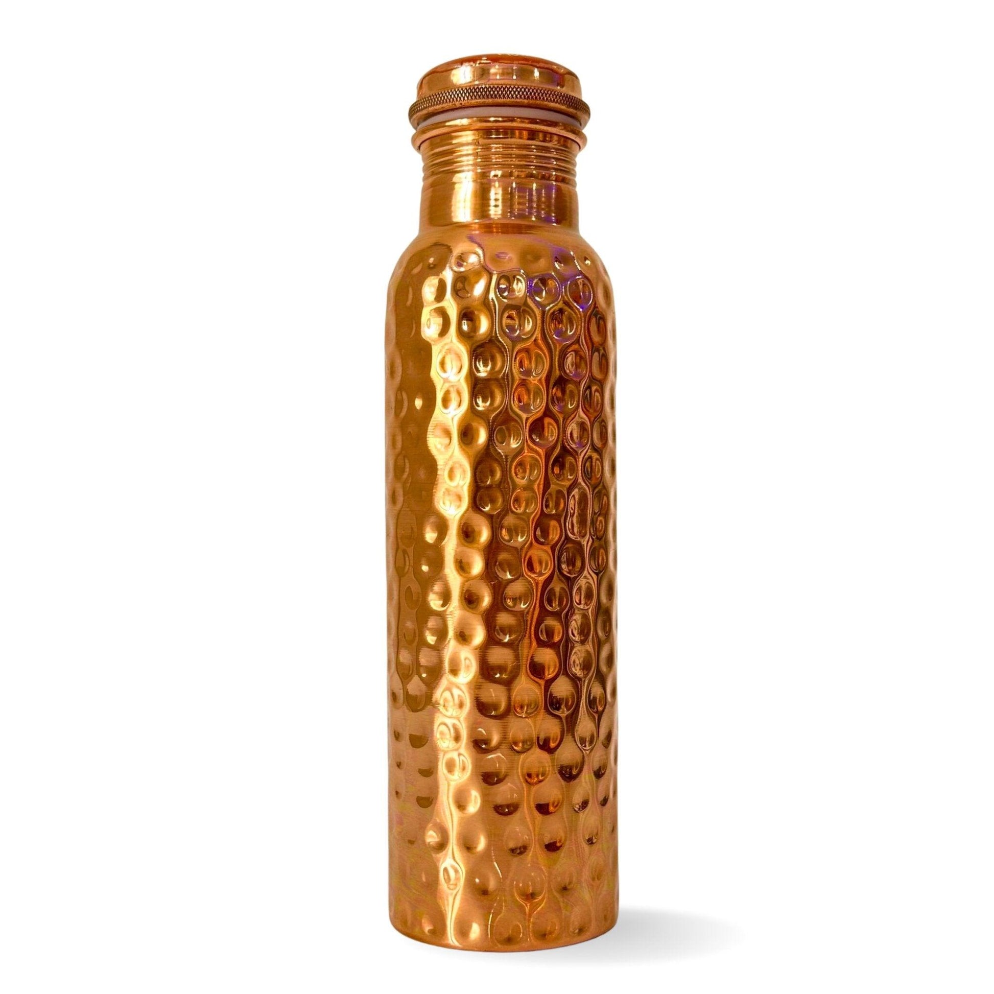 Pounded design copper bottle